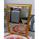 RECTANGULAR GILT FRAMED MIRROR.