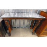 19TH CENTURY MAHOGANY SIDE TABLE WITH MARBLE TOP AND SHAPED SUPPORTS WITH PAW FEET .