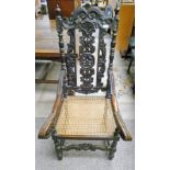 19TH CENTURY CAROLEAN CARVED OAK OPEN ARMCHAIR