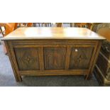 OAK COFFER WITH 3 PANEL CARVED FRONT