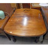 19TH CENTURY MAHOGANY DINING TABLE ON 4 REEDED SUPPORTS WITH ONE LEAF .