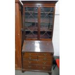 MAHOGANY BUREAU BOOKCASE WITH 2 ASTRAGLED GLASS DOORS OVER FALL FRONT OPENING TO FITTED INTERIOR