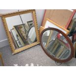 OVAL MAHOGANY FRAMED MIRROR .