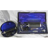 CASED SET MAY IMPROVED OPHTHALMOSCOPE AND ONE OTHER -2-