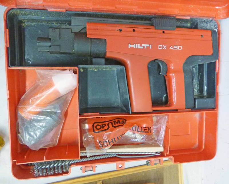 HILTI DX 450 NAIL GUN IN ITS CASE