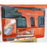 HILTI DX 450 NAIL GUN IN ITS CASE