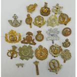 20 CAP BADGES TO INCLUDE THE LANCASHIRE FUSILIERS, ROYAL MILITARY POLICE, MIDDLE SEX REGT,