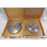 A SELECTION OF CIRCULAR SAWBLADES IN 2 WOODEN CASES