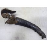 BATAK CARVED HORN WITH CARVED WOODEN STOPPER OF A CHIEF WITH HAIR HEADDRESS ON A ELEPHANT 46CM LONG