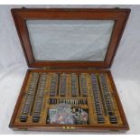 TRIAL SET OF OPTICIANS LENSES IN A GLASS FRONTED WOODEN CASE