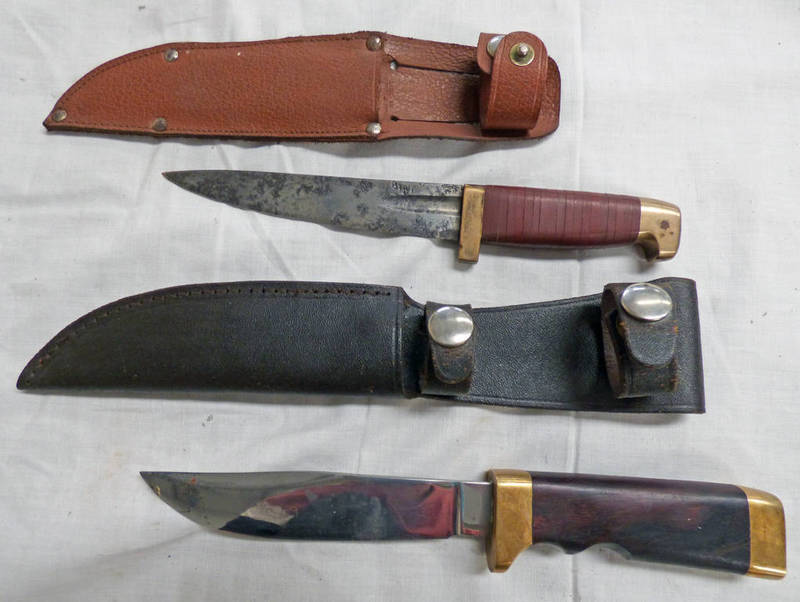 TWO KNIVES BOTH IN LEATHER SCABBARDS -2-