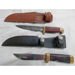 TWO KNIVES BOTH IN LEATHER SCABBARDS -2-
