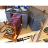 EASTMAN KODAK NO. 4 FOLDING CAMERA WITH LEATHER CASE.