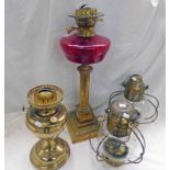 BRASS AND RED GLASS PARAFFIN LAMP,