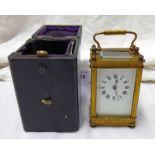 BRASS CASED CARRIAGE CLOCK MARKED MADE IN FRANCE WITH ITS LEATHER CASE AND KEY Condition