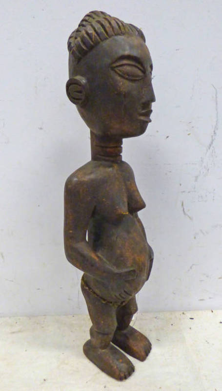 MENDE STANDING FEMALE FIGURE WEARING LOIN CLOTH,