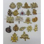 20 CAP BADGES TO INCLUDE NORTH STAFFORD, LINCOLNSHIRE, MANCHESTER, BORDER CUMBERLAND REGIMENT,