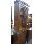 MAHOGANY BOOKCASE WITH ASTRAGAL GLAZED DOOR OVER PANEL DOOR