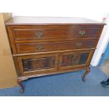 MAHOGANY CABINET WITH LONG DRAWERS OVER 2 PANEL DOORS ON SHAPED SUPPORTS LENGTH 119CM