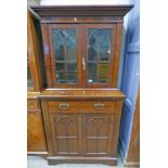 19TH CENTURY MAHOGANY CABINET WITH 2 DOOR BOOKCASE TOP OVER SINGLE DRAWERS WITH 2 CUPBOARD DOORS