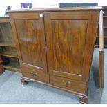 19TH CENTURY MAHOGANY LINEN PRESS WITH 2 PANEL DOORS OPENING TO SHELVES OVER 2 DRAWERS ON BRACKET