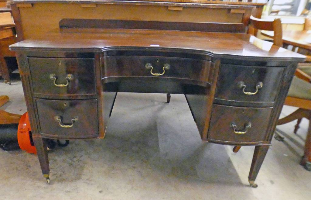 LATE 19TH CENTURY MAHOGANY DESK WITH SHAPED FRONT,