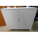 WHITE SIDE CABINET WITH 2 PANEL DOORS 112 CM TALL X 118 CM WIDE