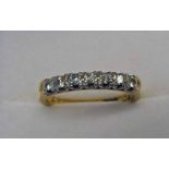 18CT GOLD 7-STONE DIAMOND SET RING Condition Report: Ring size: M.