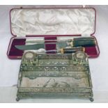 SILVER PLATED DESK SET WITH 2 CUT GLASS INKWELLS & PIERCED DECORATION & CASED HORN HANDLED CARVING