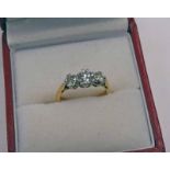 DIAMOND 3 - STONE RING IN SETTING MARKED 18CT, APPROX 0.