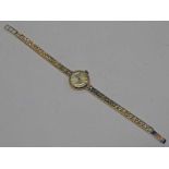 TUDOR ROYAL 9CT GOLD LADIES WRISTWATCH ON A 9CT GOLD ROLEX BRACELET - 15G