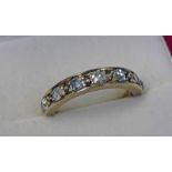 9CT GOLD 7 - STONE DIAMOND SET RING