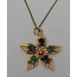 EMERALD & DIAMOND FLOWER HEAD PENDANT MARKED 9CT - WEIGHT OF PENDANT 7.