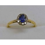 18CT GOLD SAPPHIRE & DIAMOND CLUSTER RING