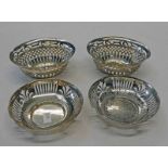PAIR OF CIRCULAR SILVER DISHES WITH PIERCED DECORATION,