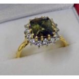 18CT GOLD DIAMOND & ANDALUSITE CLUSTER RING Condition Report: Ring size: Q.