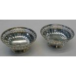 PAIR OF SILVER CIRCULAR PEDESTAL DISHES WITH PIERCED BORDER - 185G
