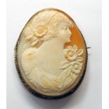 OVAL CAMEO BROOCH WITH DECORATIVELY CARVED FEMALE AND MARKED SILVER - 6CM