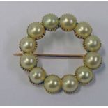 CIRCULAR CULTURED PEARL SET BROOCH 2.