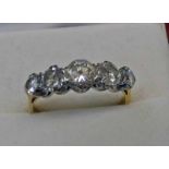 18CT GOLD DIAMOND 5-STONE RING, THE CENTRAL STONE APPROX. 0.65 CARATS, REMAINING STONES APPROX.