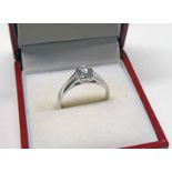 18 CARAT WHITE GOLD SET DIAMOND SOLITAIRE RING, THE BRILLIANT CUT DIAMOND OF APPROX. 0.
