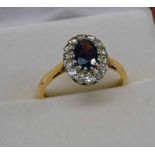 18CT GOLD RUBY & DIAMOND CLUSTER RING Condition Report: Ring size: O.