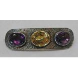 19TH CENTURY SCOTTISH SILVER AMETHYST & CITRINE BROOCH WITH ENGRAVED DECORATION - 7CM LONG