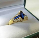 SAPPHIRE & DIAMOND SET RING.