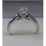 PLATINUM SET DIAMOND SOLITAIRE RING, THE BRILLIANT CUT DIAMOND OF APPROX. 0.75 CARATS - APPROX.