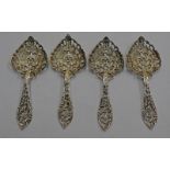 SET OF 4 SCOTTISH SILVER DUTCH STYLE CADDY SPOONS WITH PIERCED CHERUBIC DECORATION GEORGE EDWARD &