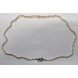 CULTURED PEARL NECKLACE ON DIAMOND & PEARL SET CLASP MARKED 9CT