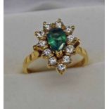 18CT GOLD EMERALD & DIAMOND CLUSTER RING,