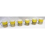 6 YELLOW PARAGON FINE CHINA CUPS IN PIERCED SILVER MOUNTS WITH HANDLES BY WALKER & HALL LTD,