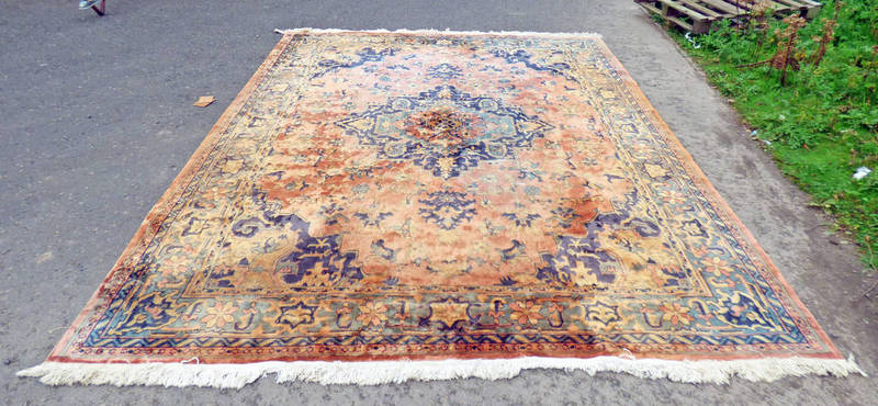ORANGE & BLUE MIDDLE EASTERN RUG, 353 X 275 CM Condition Report: Fading throughout.